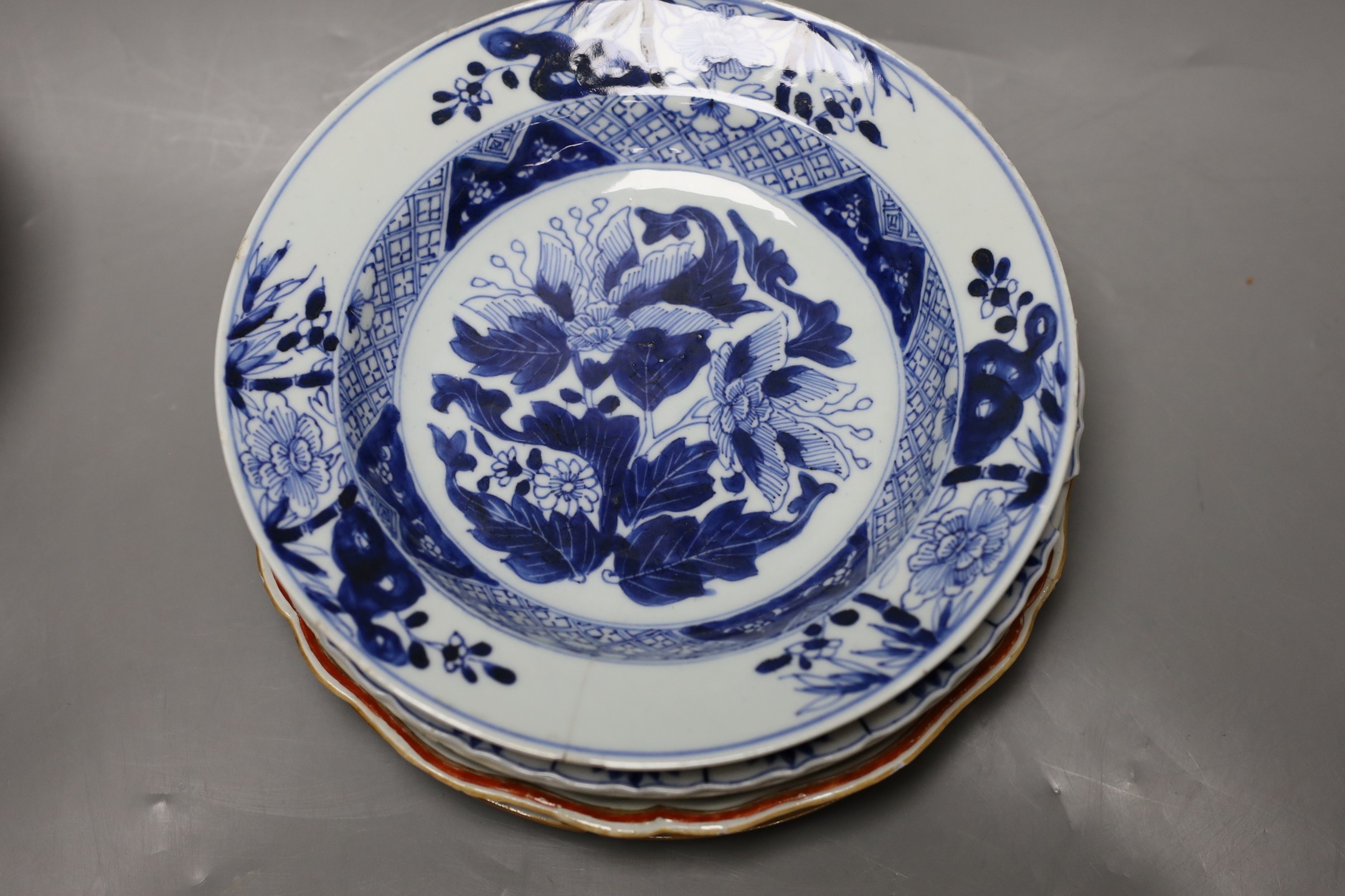 A group of 18th / 19th century Chinese blue and white plates and bowls, Largest 22 cm diameter